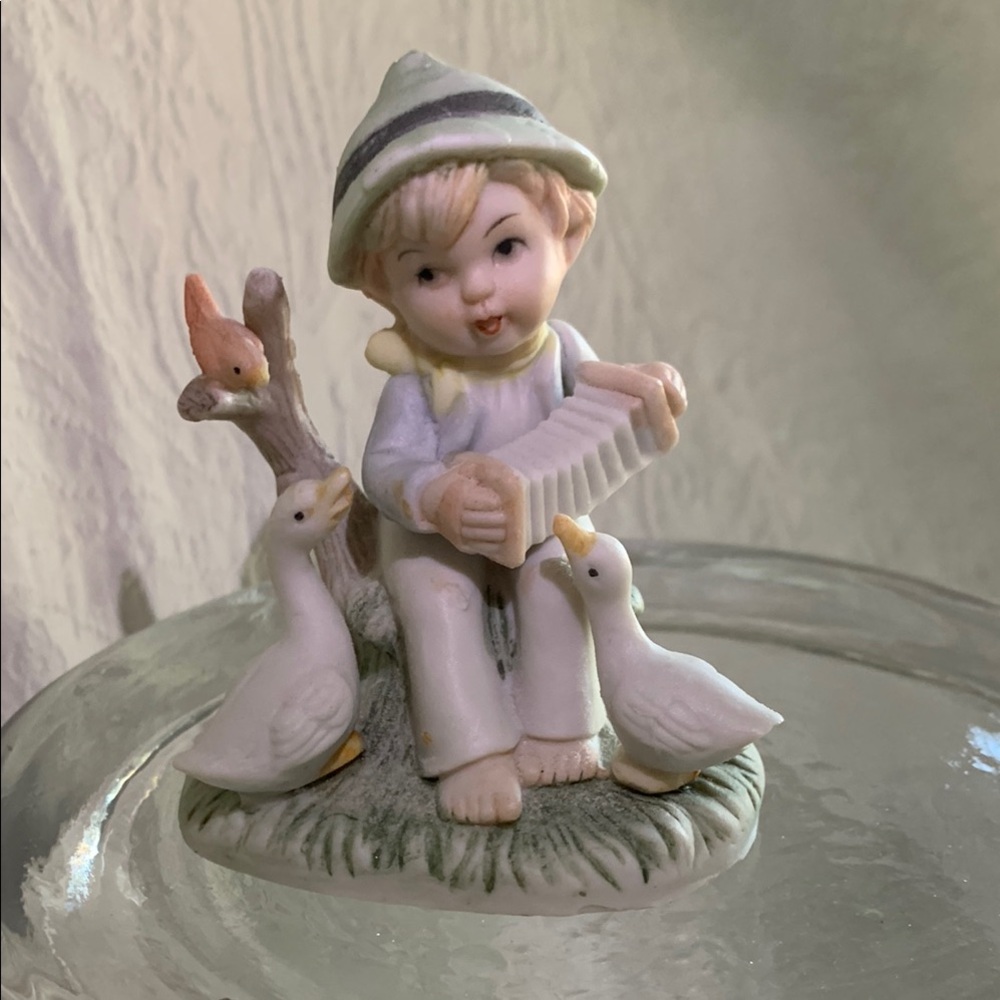 Charming Boy Figurine playing Harmonica for 2 Ducks & a Bird